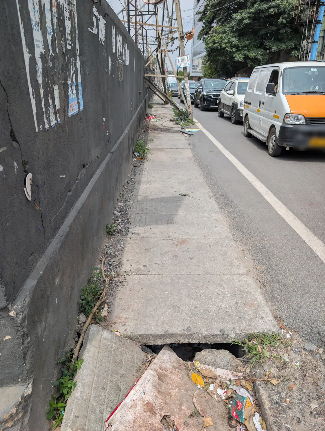 A pole planted in an open drain, 25 Sep 2026
