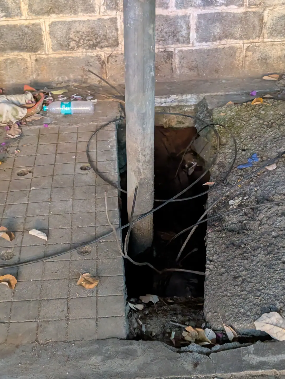 An open drain, a utility pole and a cave-in, 13 Oct 2026