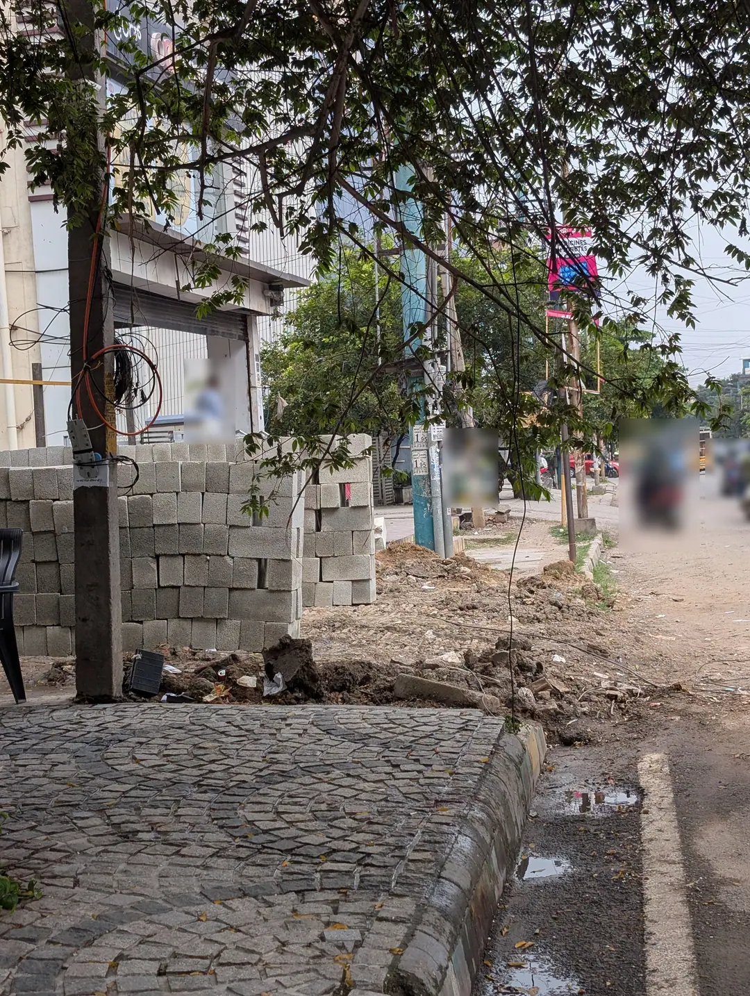 Footpath doubles as a masonry yard